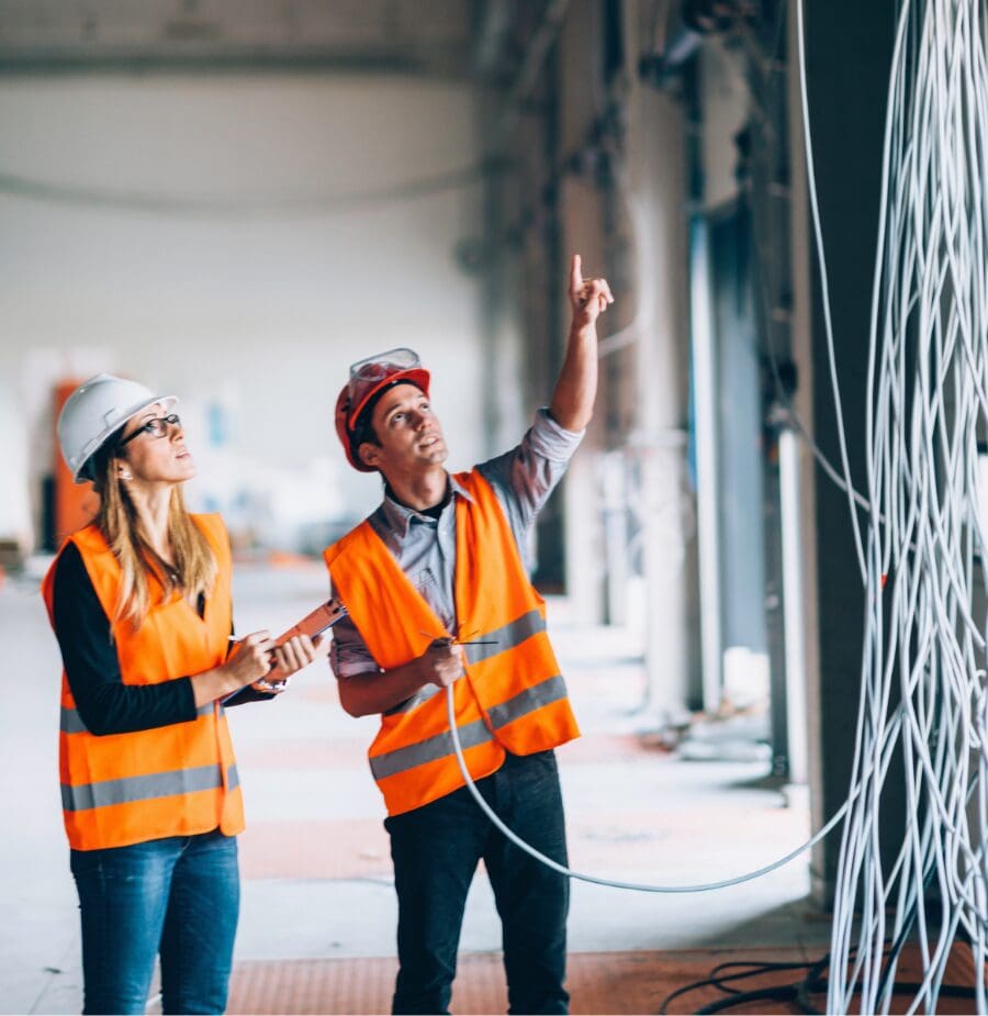 Industry Sector Partnerships - Construction Workers Reviewing Wring